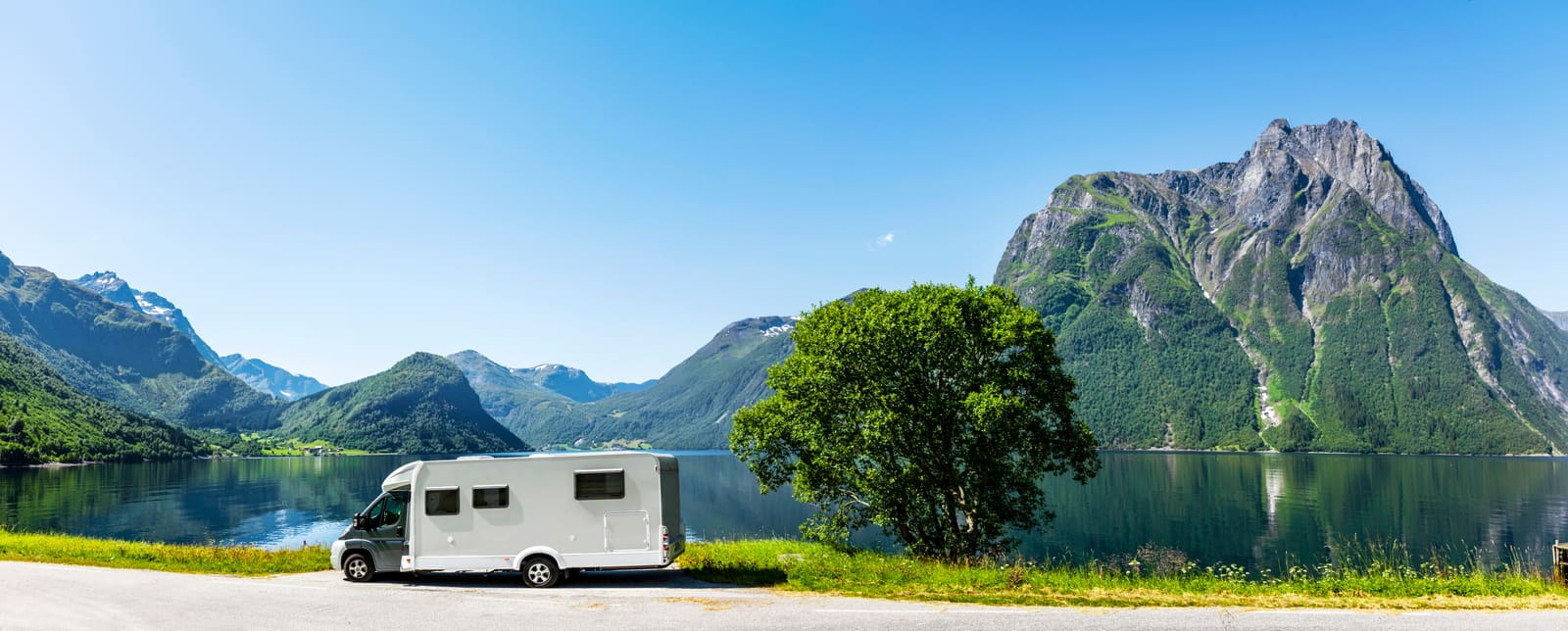 Motorhome on European mountain road, Purchase Assistance