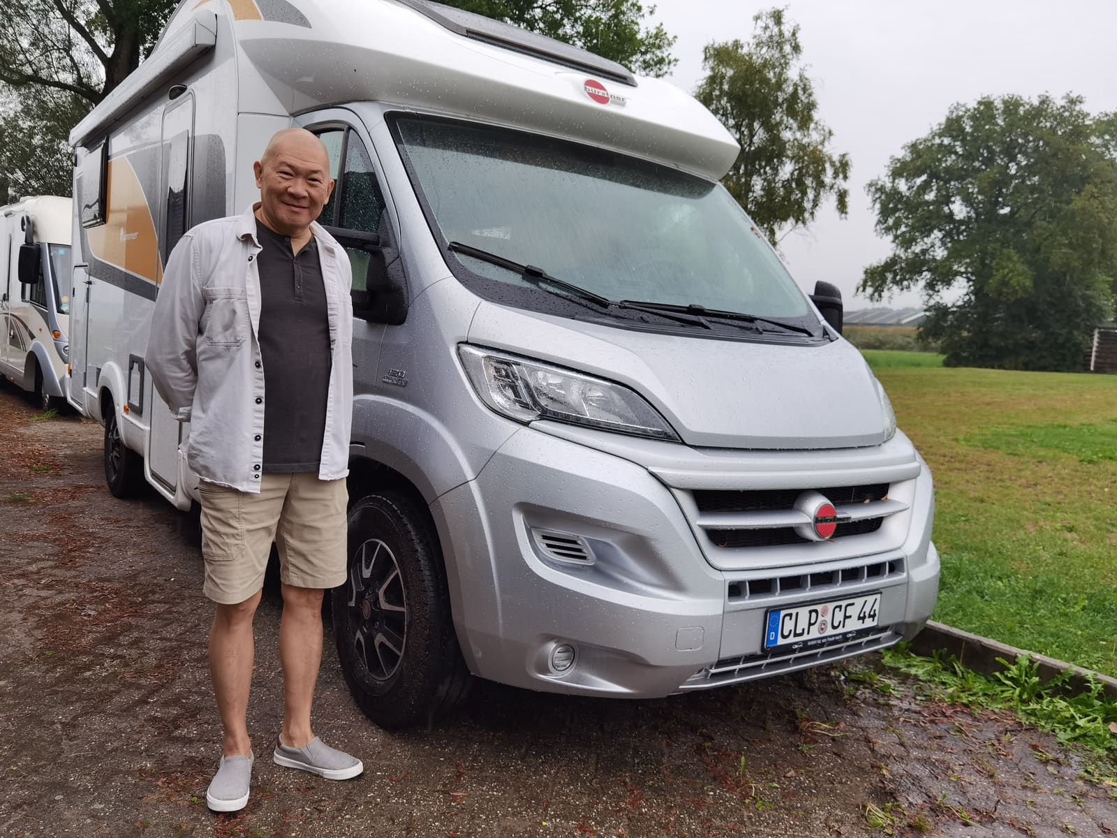 Customer family with their registered motorhome in Europe